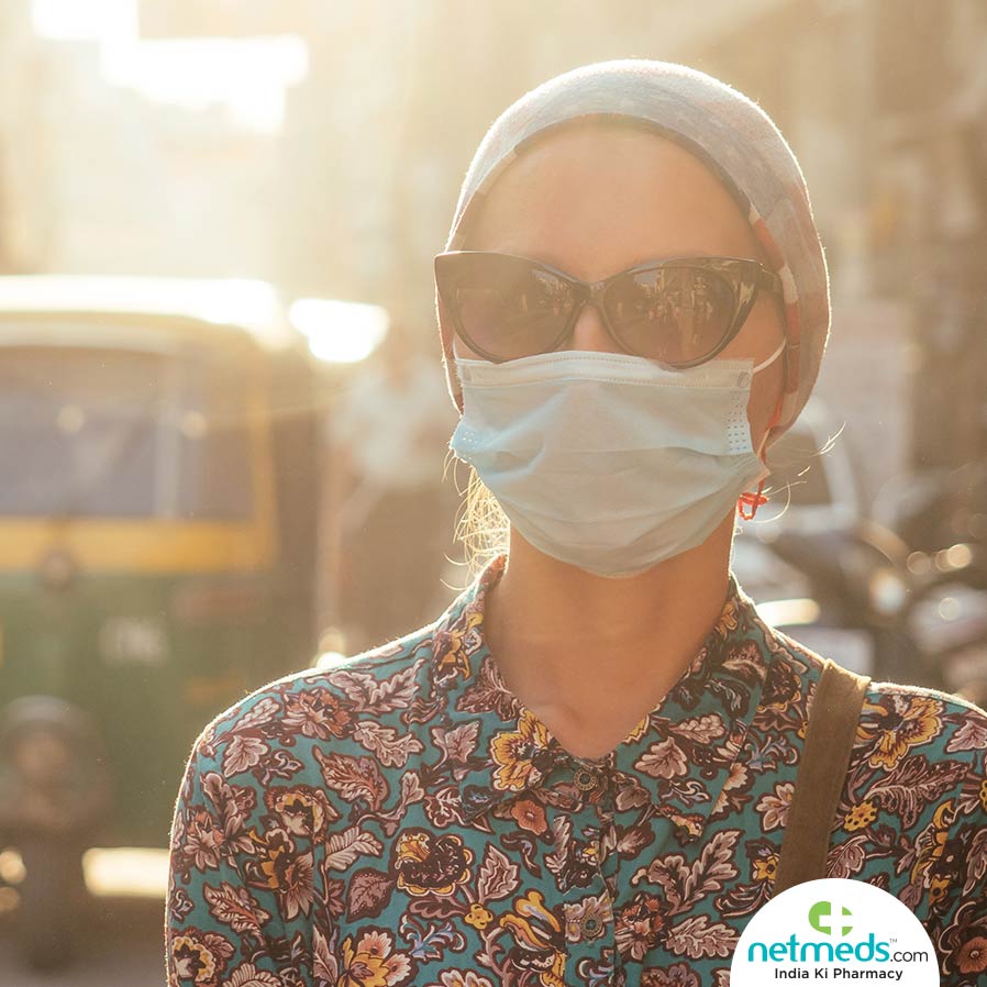 Woman wearing mask and glasses