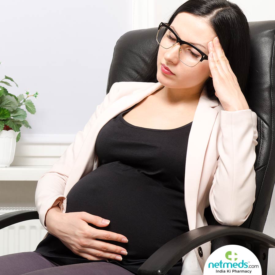 Pregnant Woman In Office