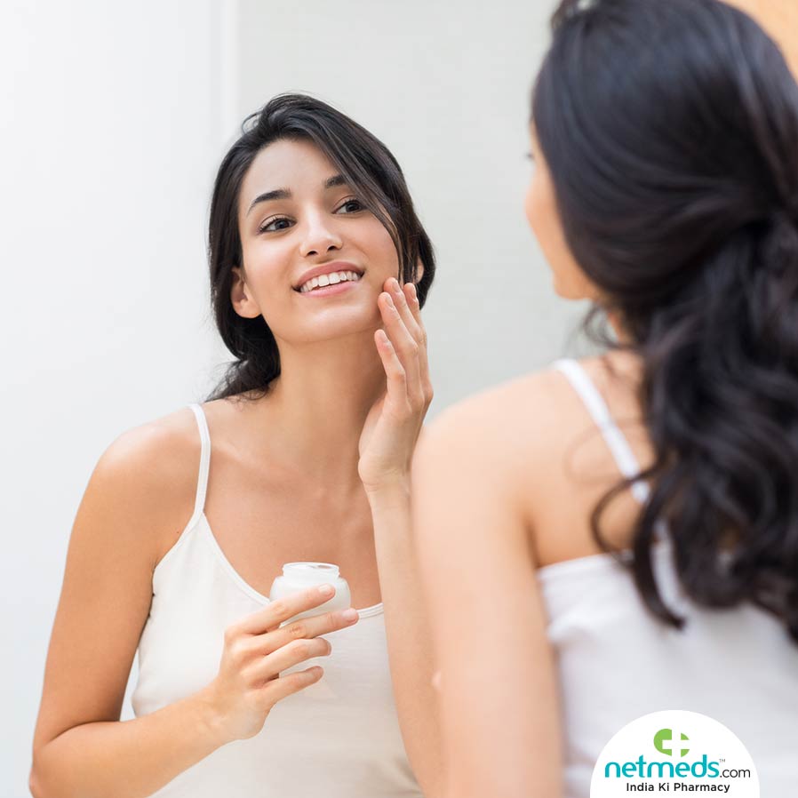 Woman Using A Skin Care Product