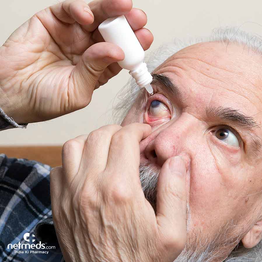 Old Man Using Eye Drops