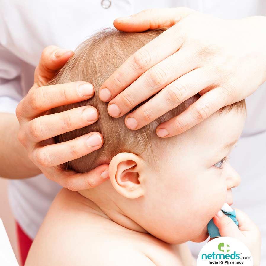 Holding child's head