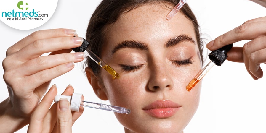 Woman using vitamin C serum