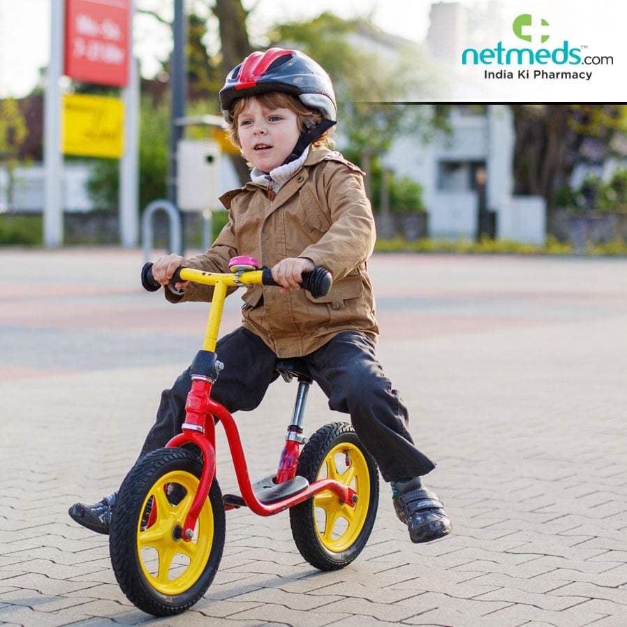 a boy riding a cycle