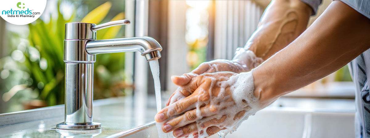 hands-washing-water-dimly-lit-kitchen_1200x450