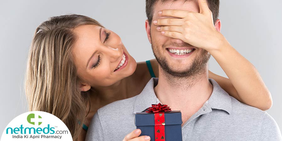 Woman giving gift to her spouse