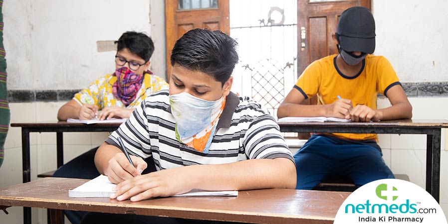 Students writing in classroom