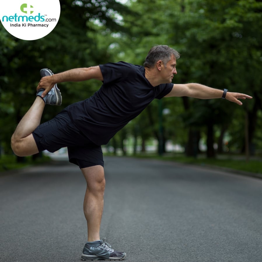 Man exercising on the road