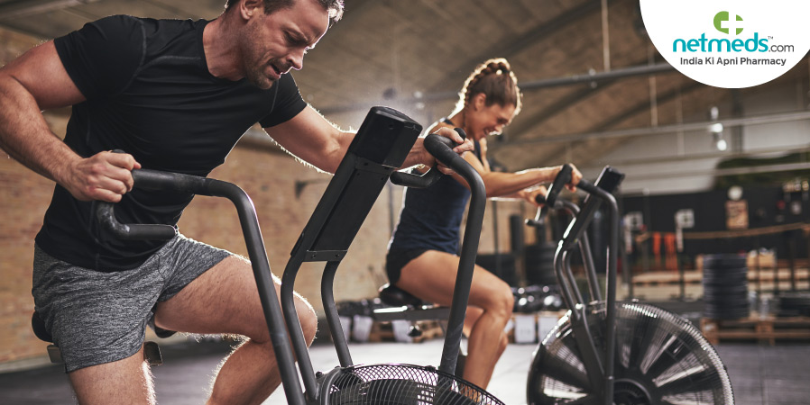 Man and woman working out in gym