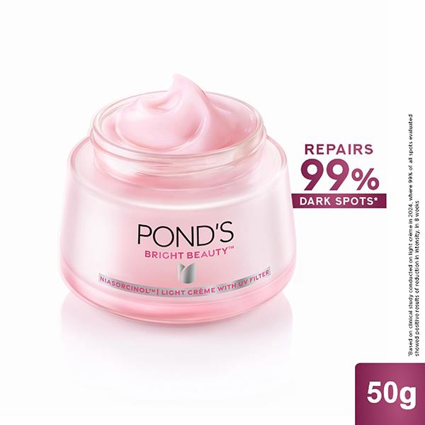 Netmeds | Pond's Bright Beauty Light Cream with UV Filter, Niasorcinol, Fades Dark Spots, Brightens Skin 50gm